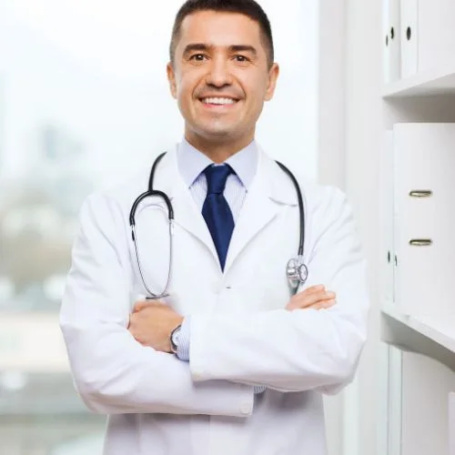 Health professional in a white coat representing the doctor-formulated JointsAid joint blend